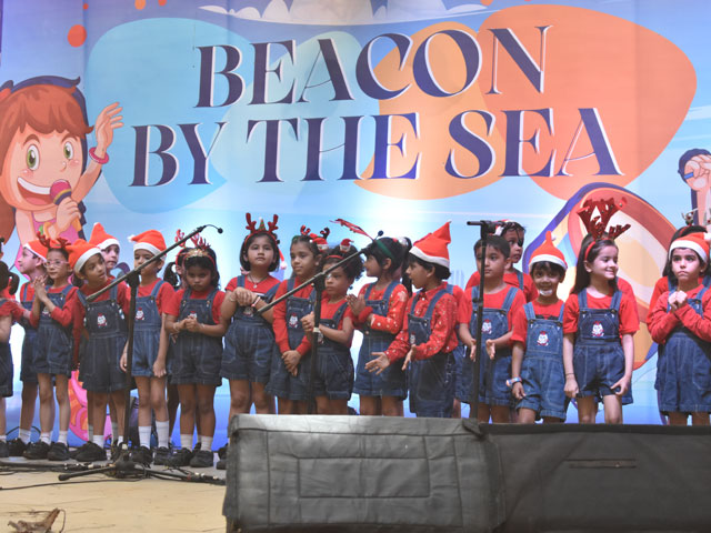 children singing at beacon by the sea event